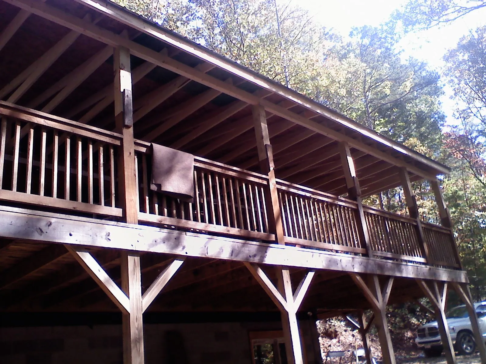 Timber framing under a new elevated porch and deck — Roof Leak Repair in North Olmsted by Roofing Brothers